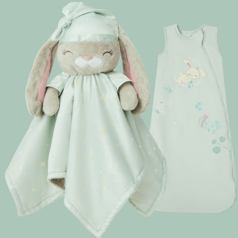 An image of the Zelkii Bunny Collection: on the left is the 'asleep' mint Bunny LuviDuvi lovey, and on the right is the mint bamboo sleep sack with a Bunny and cloud design.