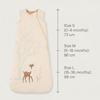 Zelkii® baby sleep sack size and fit chart showing total length measurements. Size S (0–6 months) measures 73 cm, Size M (6–18 months) measures 86 cm, and Size L (18–36 months) measures 99 cm, displayed alongside a cream sleep sack with fawn illustration.