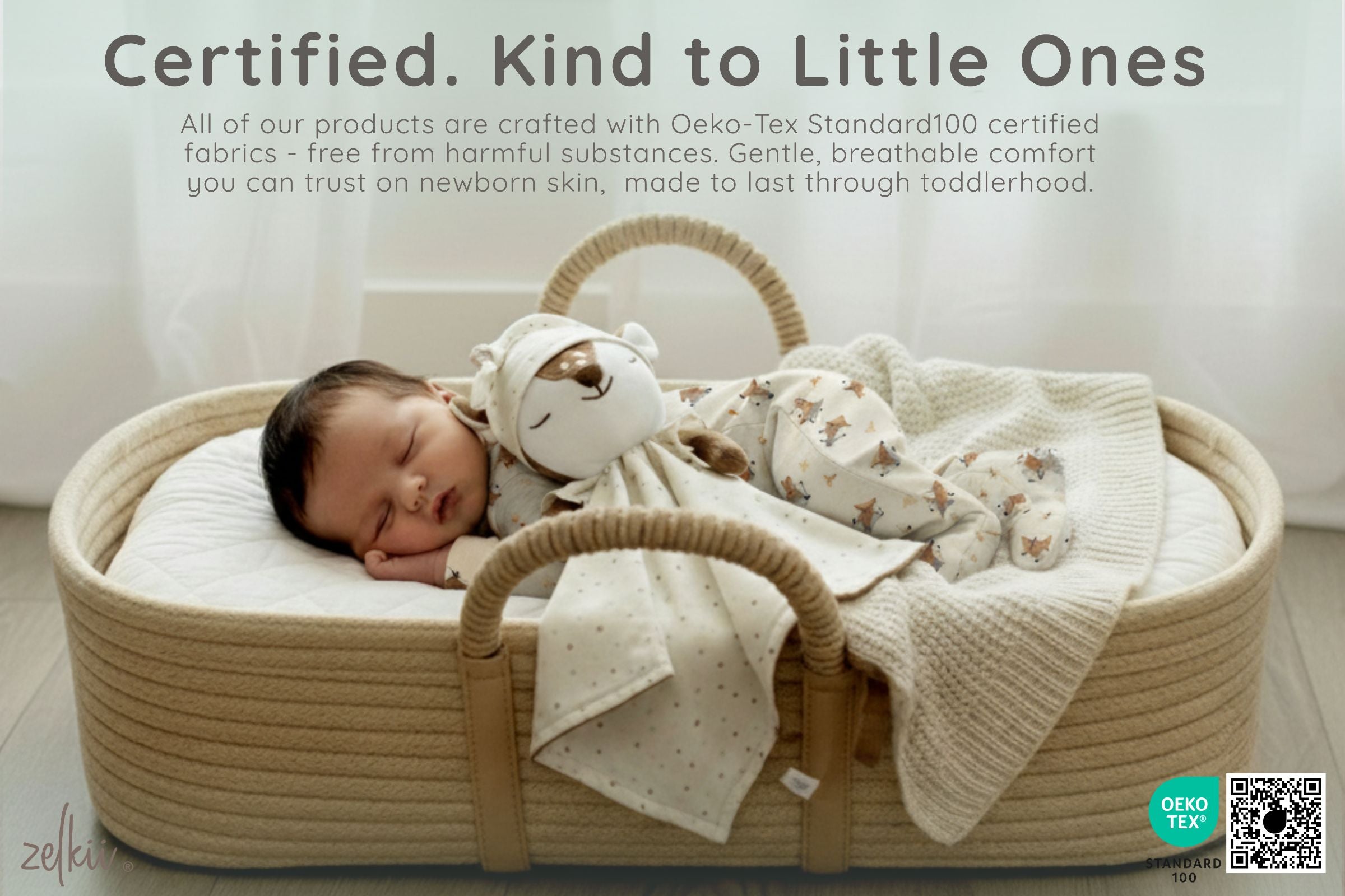 Newborn baby sleeping in beige Moses basket wearing bamboo pajamas with luviduvi comforter, Oeko-Tex certified by zelkii.
