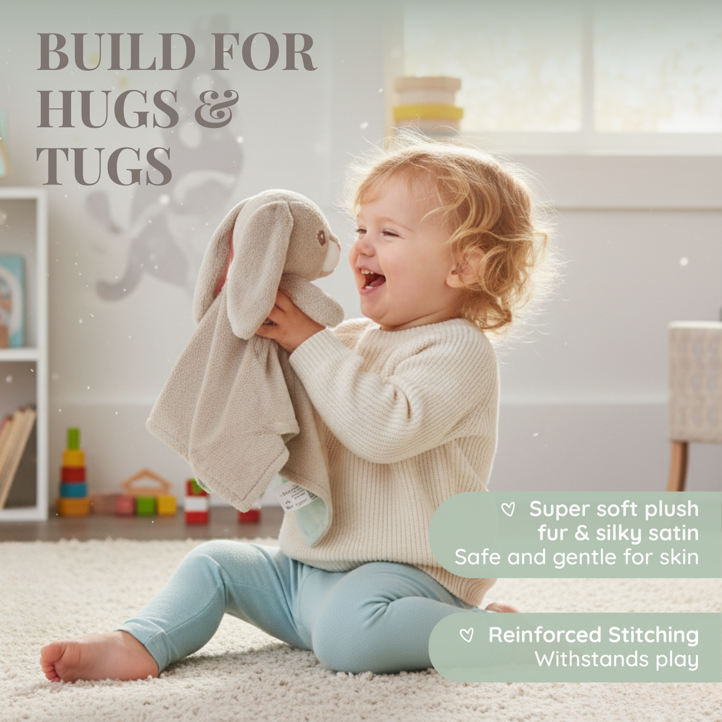 A laughing toddler sits on a rug, holding up the 'awake' side of a Zelkii bunny LuviDuvi lovey, with text 'Build for Hugs & Tugs.