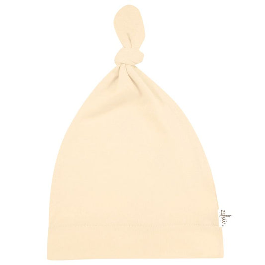 Zelkii cream-coloured bamboo baby beanie with top knot"