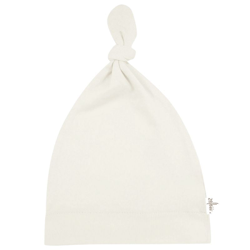 Zelkii white coloured bamboo baby beanie with top knot
